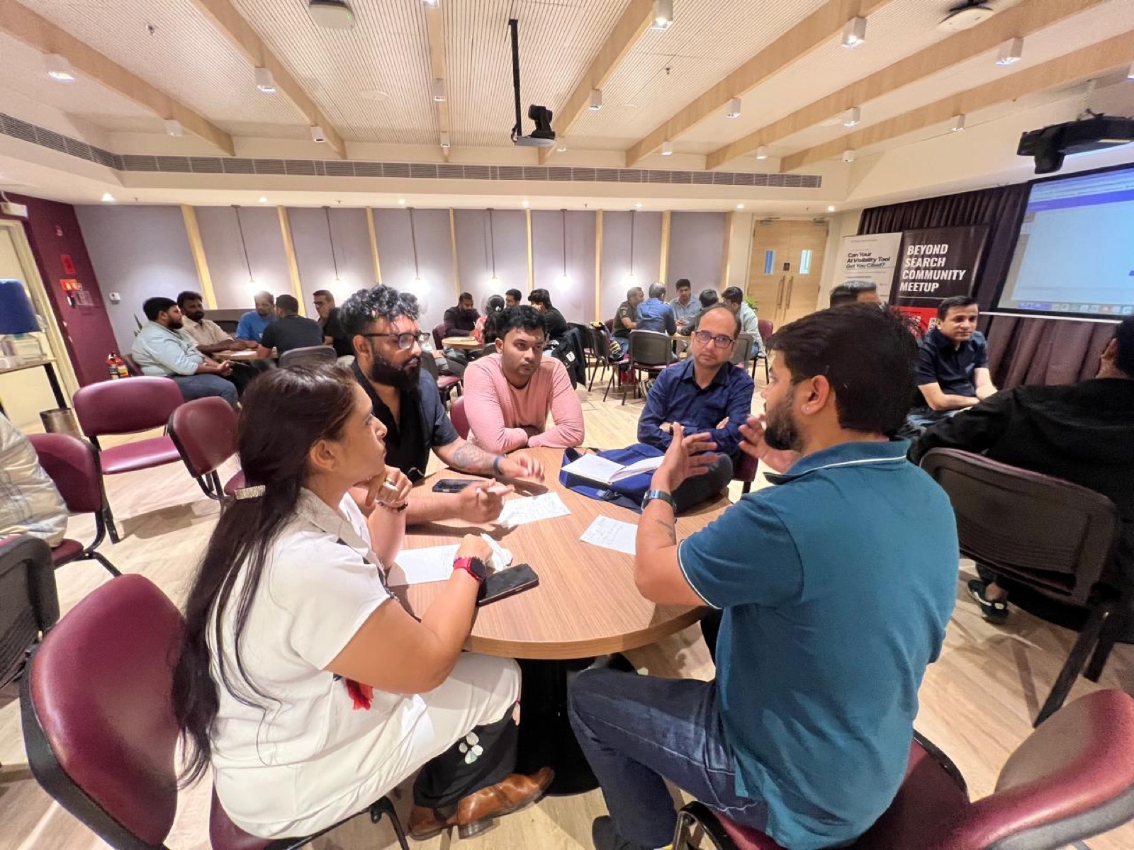 A table mid-discussion at the Bengaluru meetup