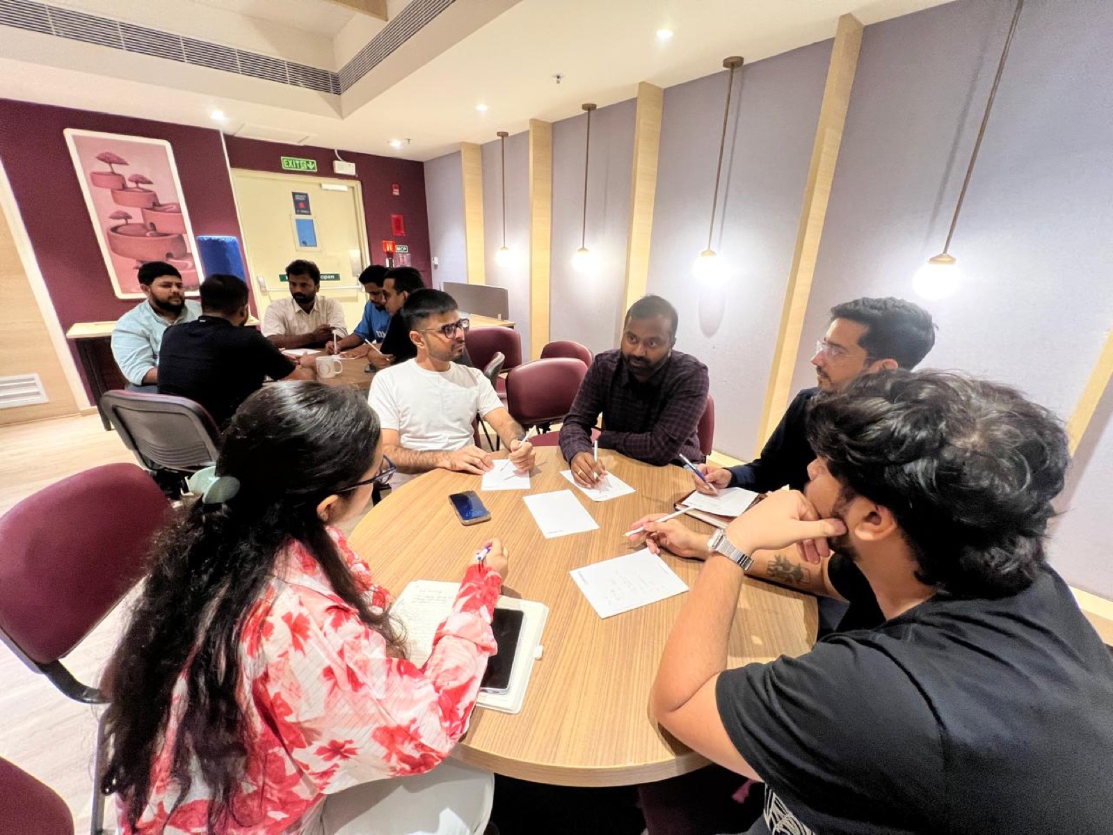 A mastermind group working through a problem